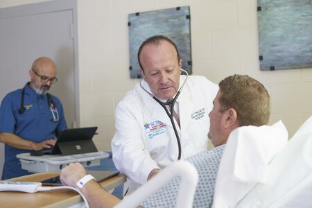 male provider with male patient