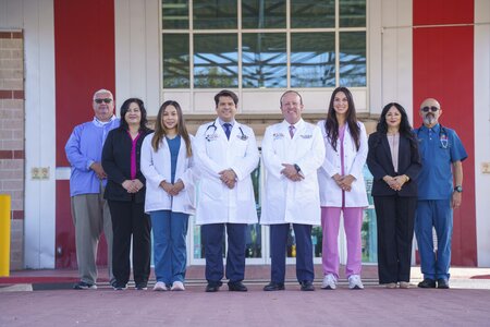 Two female Medical Professionals smiling at each other